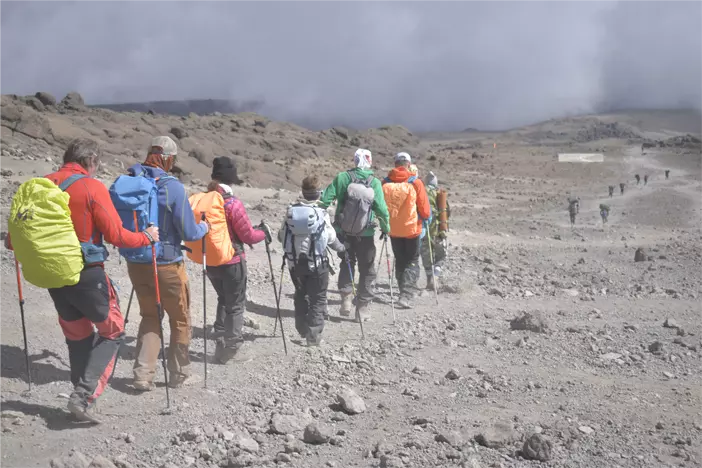 Group of climbers during Kilimanjaro climbing via the Rongai route Group of climbers during Kilimanjaro climbing via the Rongai route